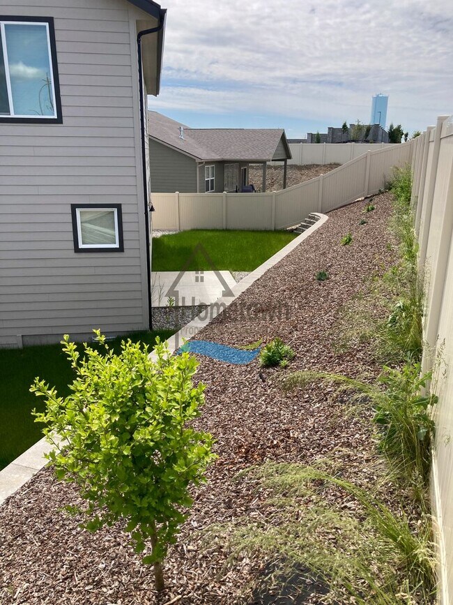 Building Photo - Woodbridge South Home with 4 Bedrooms and 3 Bathrooms in Post Falls build in 2021!