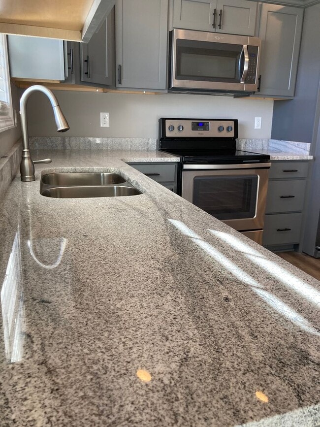 Building Photo - New & Improved Price!