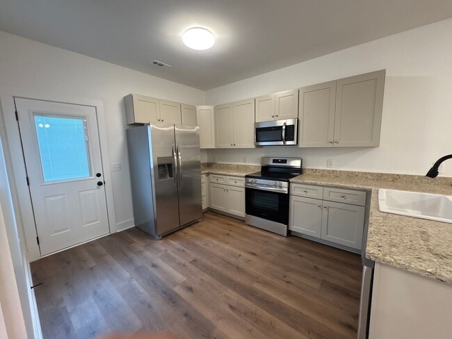 Building Photo - Beautiful New Construction Townhome in She...