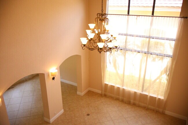 Building Photo - 10345 Medicis Pl