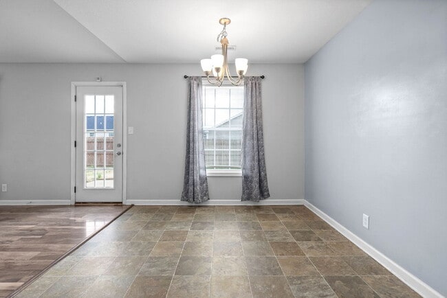 Building Photo - RANCH with huge, fenced yard on a corner lot!! Minutes to Fort Campbell, I-24, Clarksville, and a...