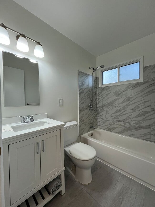 Building Photo - AVAILABLE NOW! Upgraded 3+1.5 w/backyard, ...
