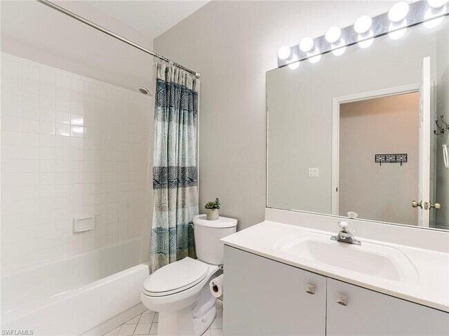 Building Photo - Turnkey 2-bedroom plus den villa, perfectly situated to capture stunning golf course and lake vie...