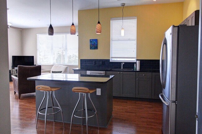 Building Photo - Downtown Durham 1bd/1ba Corner-Unit Condo with On-Site Personal 1-Car Garage!