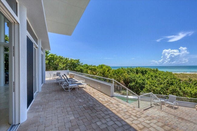 Building Photo - Beach Access & Gulf Views From This Incred...