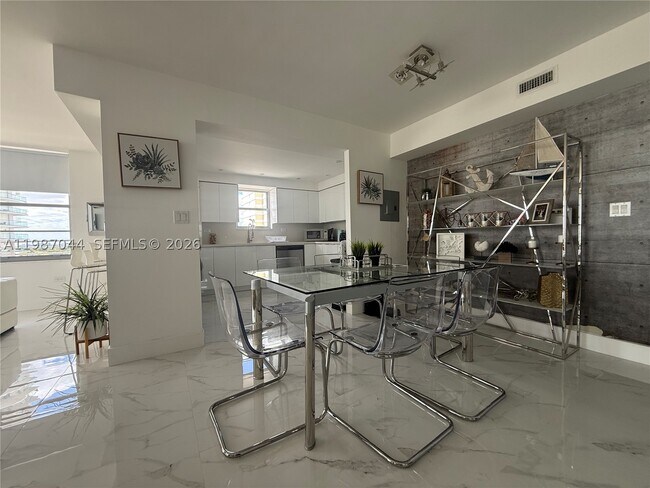 Building Photo - 5555 Collins Ave