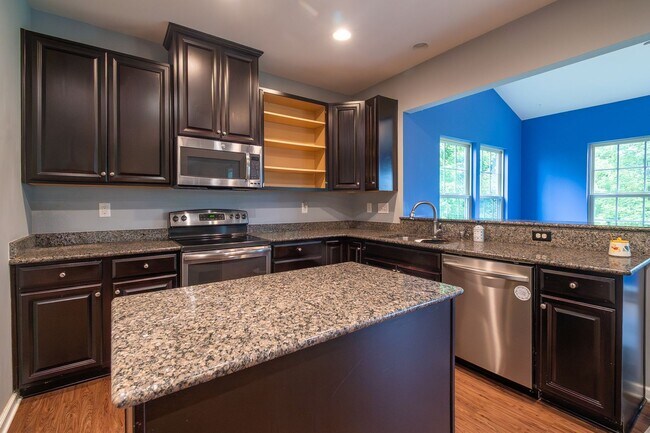 Building Photo - Spacious 4-Bedroom Home with Sunroom, Deck...