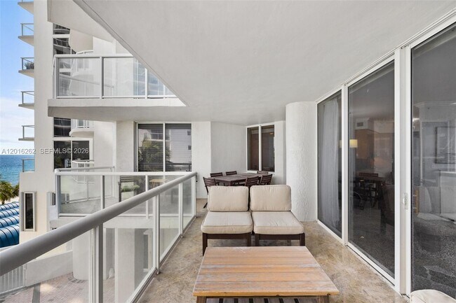 Building Photo - 18671 Collins Ave