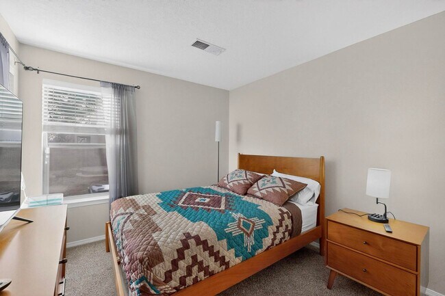 Building Photo - COMING SOON! Furnished 2 bedroom 2 bath Townhouse With A Bonus Room in a Great Location!