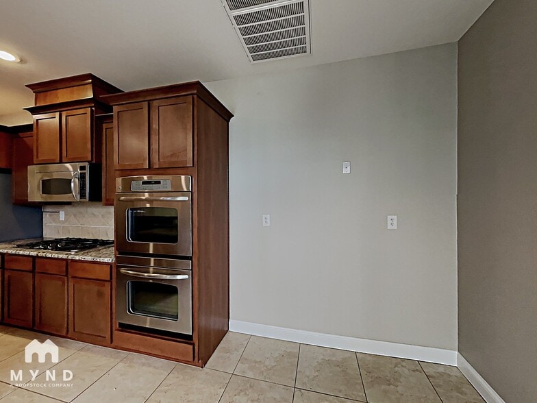 Building Photo - 6982 Castle Mountain Ave