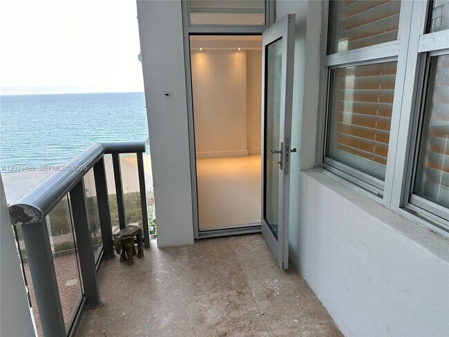 Building Photo - 6039 Collins Ave