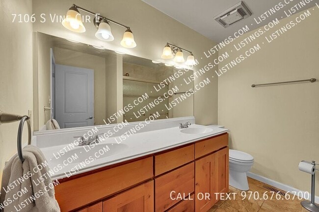 Building Photo - 7106 S Vine Cir E