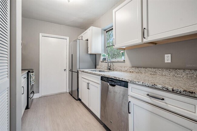 Building Photo - 6985 Merrick Ln