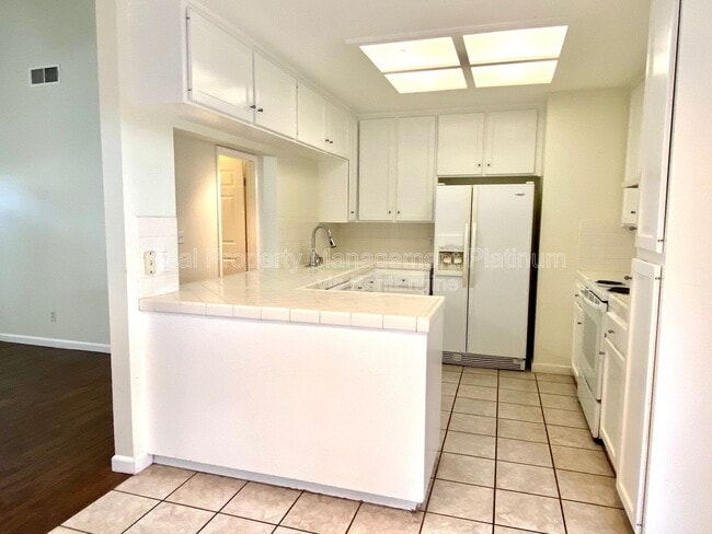 Building Photo - 5811 W Sample Ave