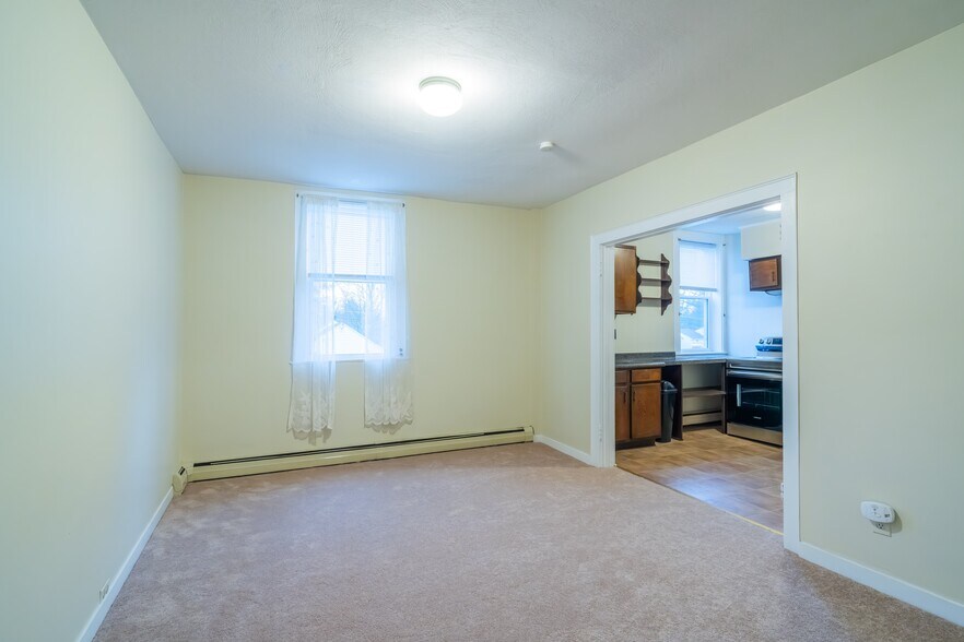 Living Room towards kitchen - 100 N Main St