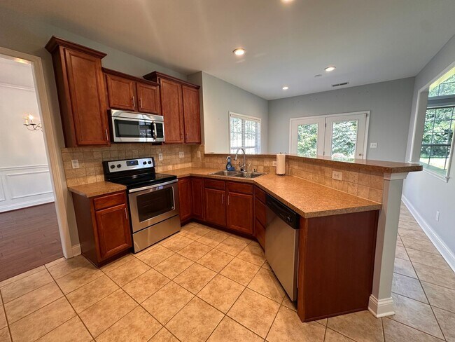 Building Photo - Elegant 4BR Home with Soaring Ceilings in The Reserve at Glenmary