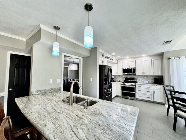Building Photo - Available 07-01-26! 2-Car Attached Garage - Pet Friendly w/Restrictions - Fenced Yard on a HUGE C...