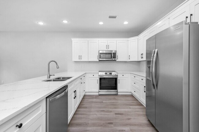 Building Photo - Modern 4BR Home with Private Fenced Yard Near the Beach