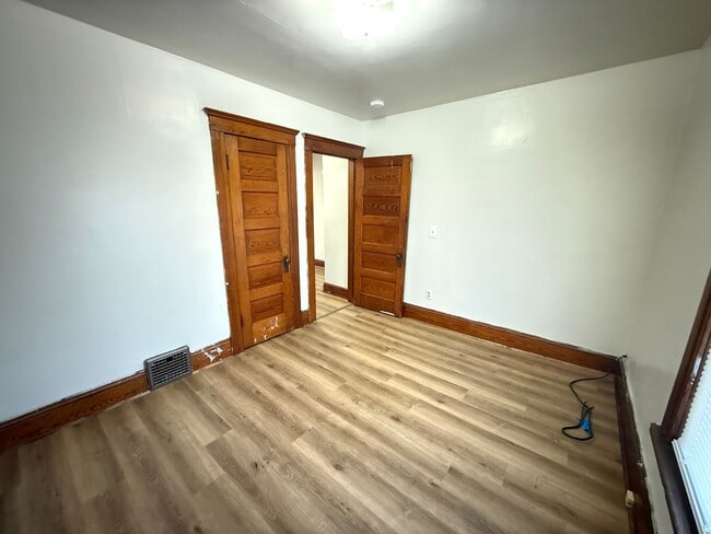 Building Photo - Spacious Historical Three-Bedroom Home with Classic Character- NEW FLOORING