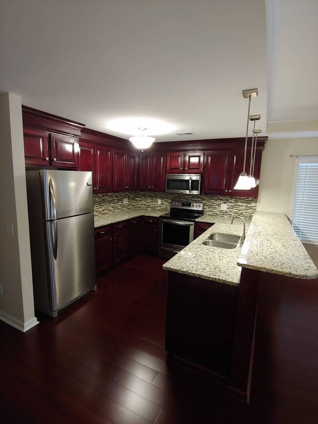 Building Photo - College students welcome