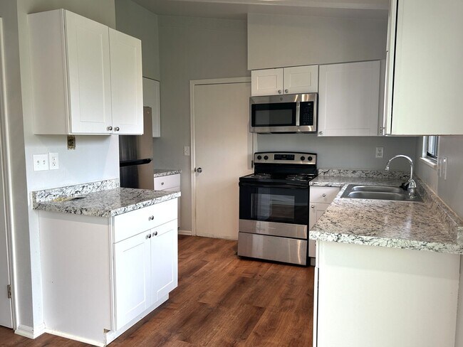 Building Photo - Spacious Fort Collins Rental with Hardwood Floors & Flex Space