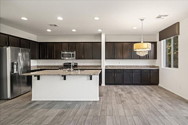 Building Photo - Modern 3 Bedroom Retreat with Designer Finishes & Entertainer’s Backyard