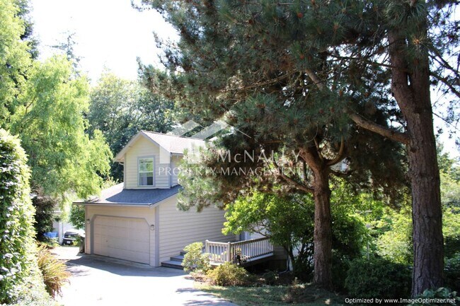 Primary Photo - 3-Bedroom Home Nestled on Wooded Lot with ...