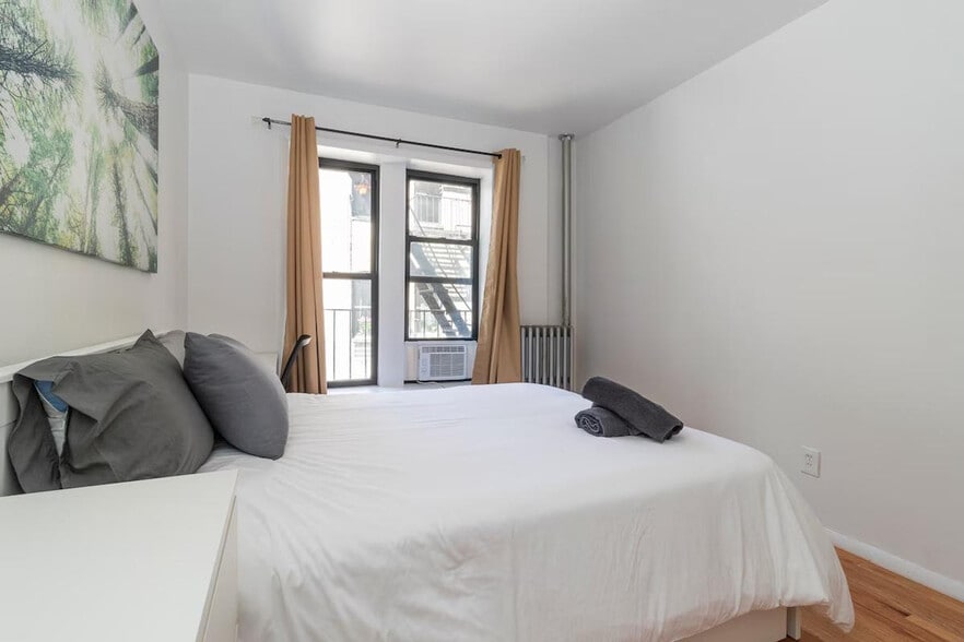 Building Photo - 306-318-318 E 96th St