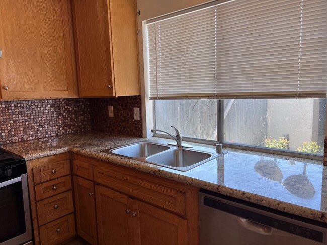 Gorgeous kitchen view of large private backyard - 2356 Canyon Park Dr