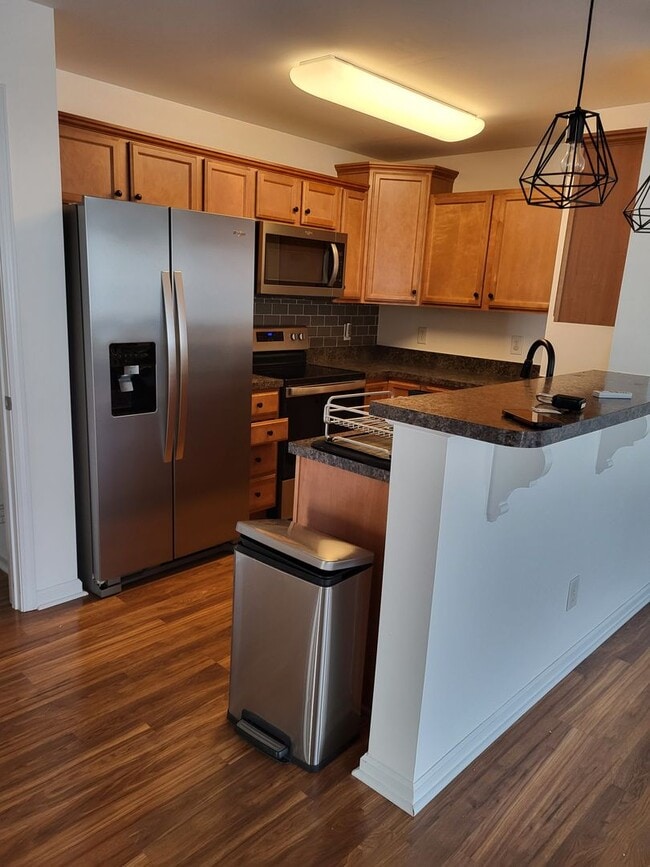 Building Photo - Welcome home to this charming second-floor 2 bedroom, 2 bath condo.