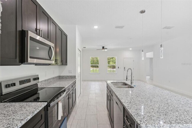 Building Photo - 10089 N Athenia Dr