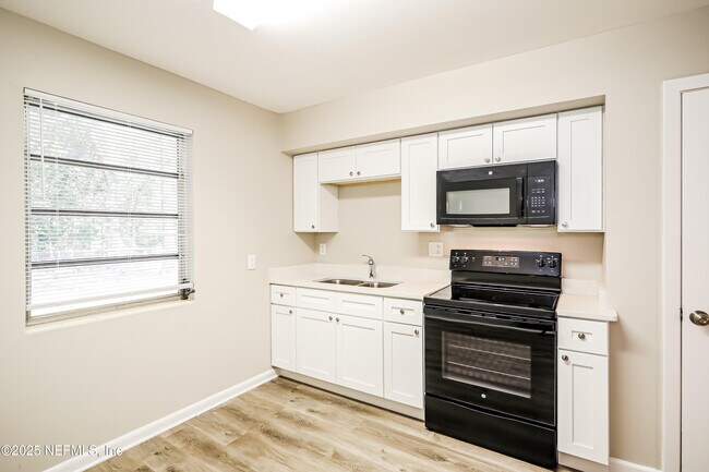 Building Photo - 5805 Norde Dr E