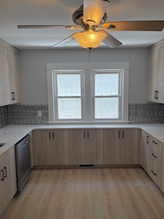 Quartz countertops wrap around for extended counterspace - 381 Huntington Ave