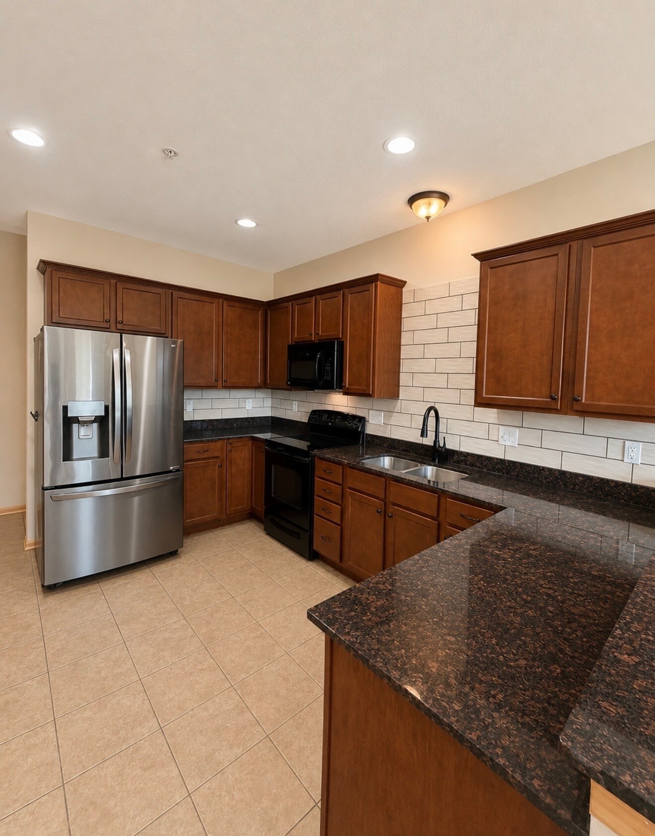 Large kitchen with granite counters - 551 87th St