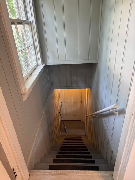 Stairwell to apartment - 526 Grace St