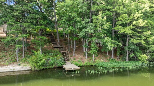 Building Photo - Serene Bella Vista Lakeside 4 bedroom