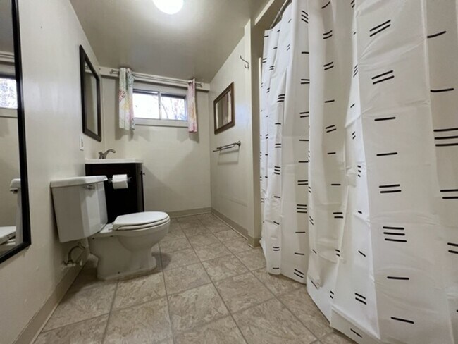 Building Photo - Bi-Level House w/ Massive Backyard, Storage, & Character!