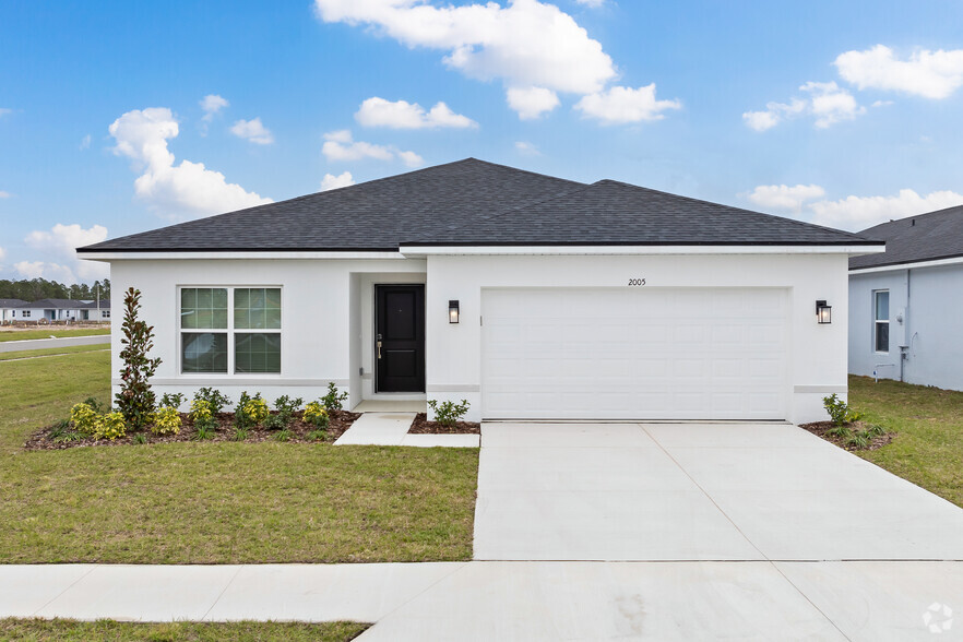 4BR, 2BA - Front - Preserve at Poinciana