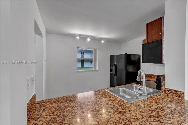 Building Photo - 2800 NW 56th Ave