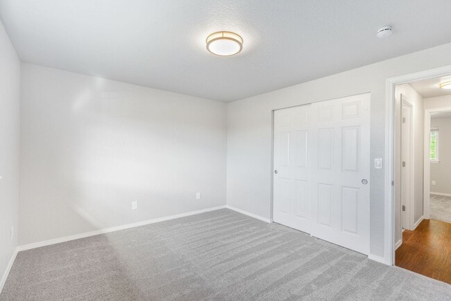 Building Photo - Recently updated 3 bdrm, 2 bath. Attached garage. Wrap around yard. Private upstairs bedroom and ...