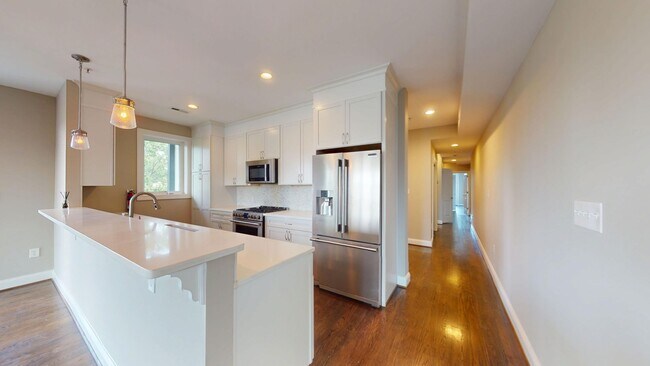 Building Photo - Stunning Three Bedroom Penthouse Condo W/Three Private Outdoor Spaces & Parking Included!