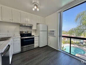 Building Photo - Upgraded 2 Bedroom Condo in San Carlos!!  ...