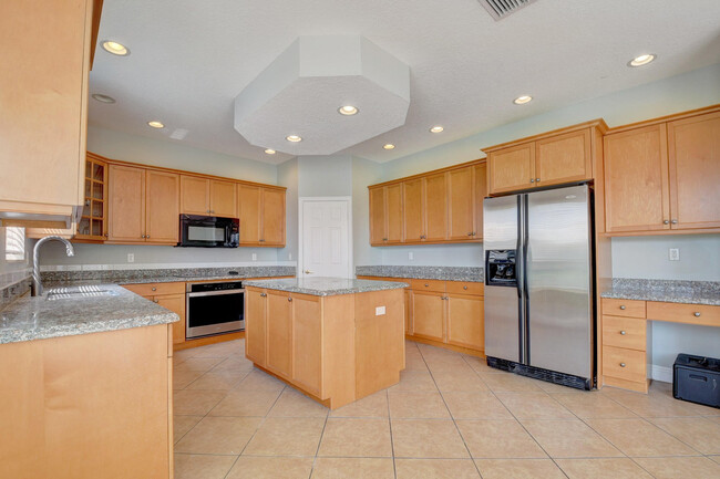 Building Photo - 9864 Woolworth Ct