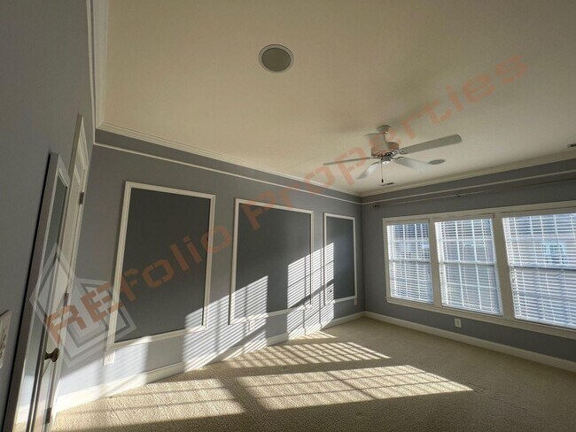Building Photo - Elegant 3 Story 3 Bedroom Formal Model Tow...