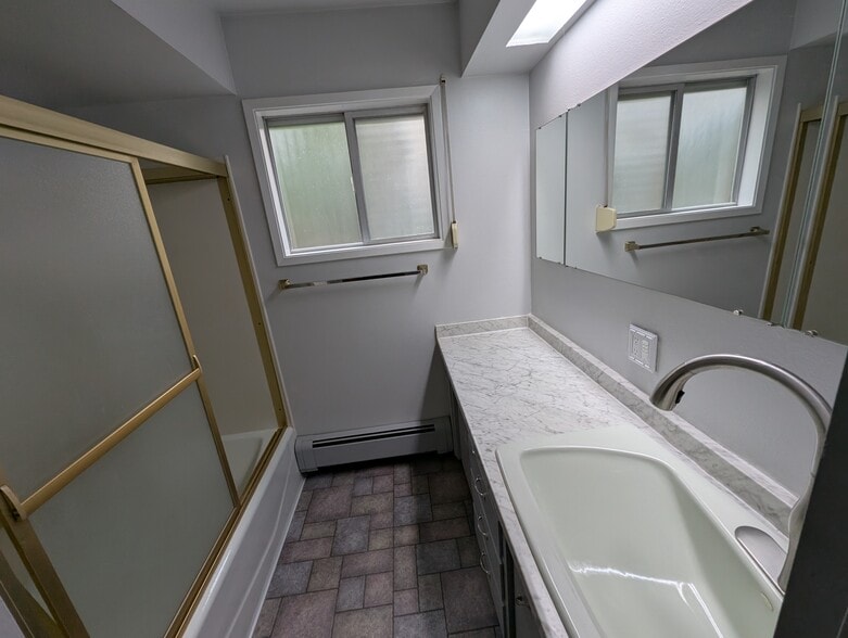 glass shower door - 2575 Yew Street Rd