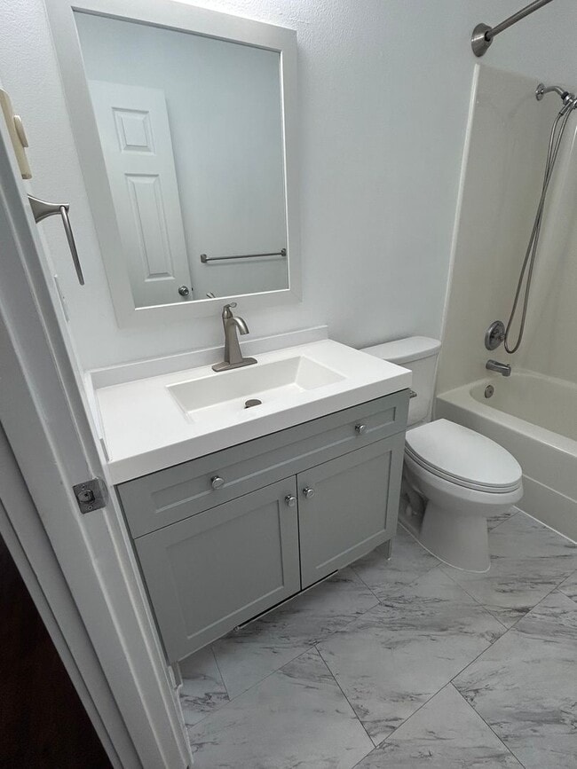 Building Photo - Beautifully Remodeled 2 Bedroom 1 Bath Duplex w/ Large Yard!! Pets are welcome! Electric car char...