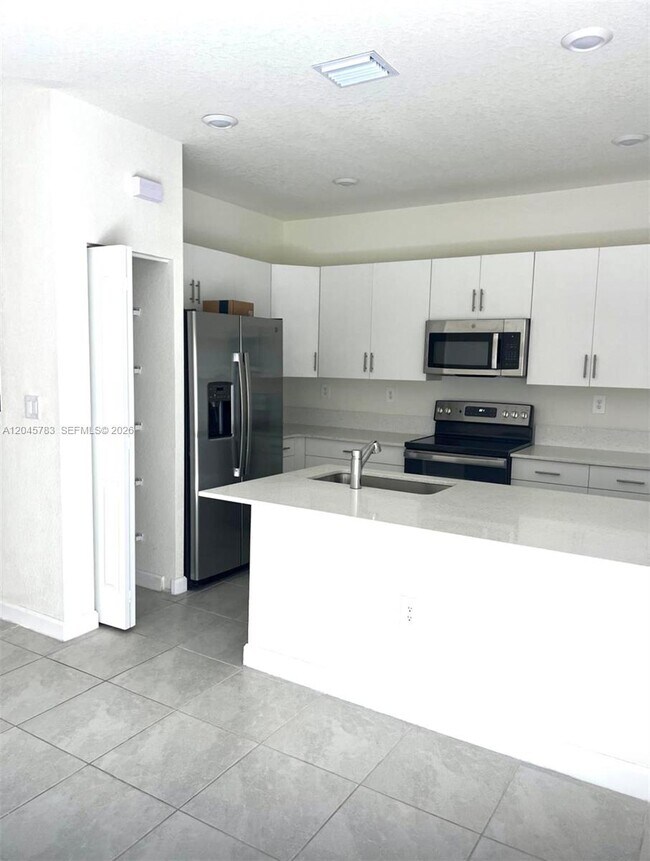 Building Photo - 11444 West 33rd Ct