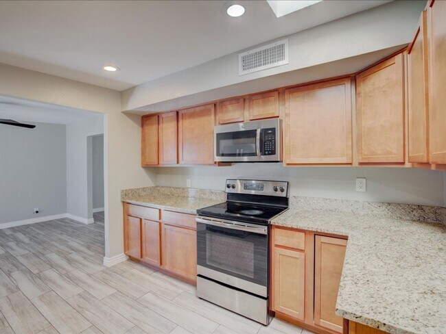 Building Photo - Spacious 4-Bedroom, 2-Bath Home with Extended Driveway & Large Backyard