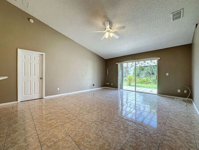 Building Photo - Poinciana single family home in Village 7,...