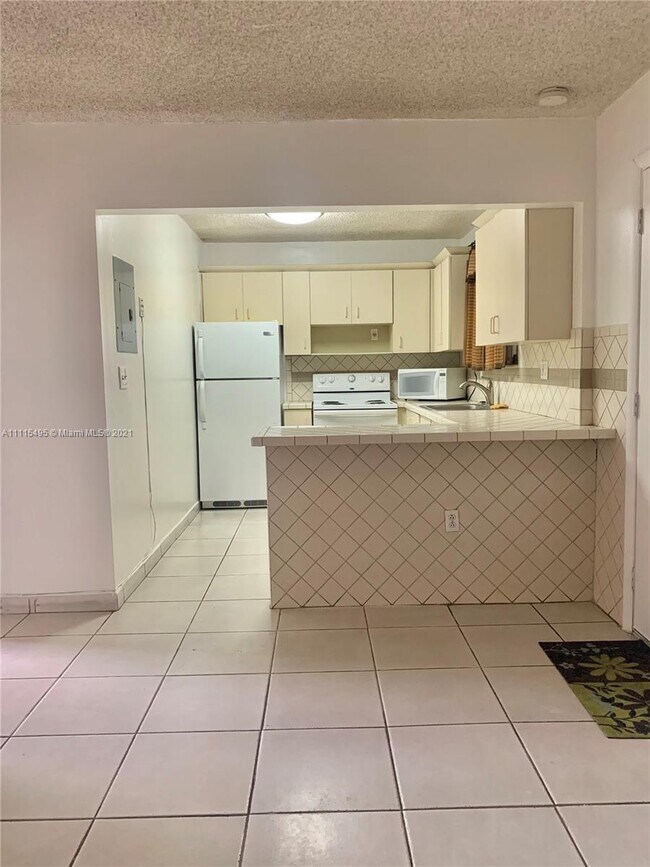 Building Photo - 1250 W 26th Pl